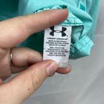Under Armour  women's turquoise heat gear‎ long sleeve active button zip shirt M Photo 6