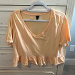 Wild Fable  orange crop t-shirt with ruffle detailing on bottom Sz M Photo 0