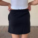 Black cotton mini skirt with elastic waist and tie Size M Photo 3