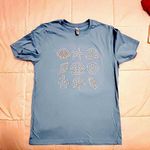 Bella Canvas  Blue T-Shirt. “Seashells” Size Large Photo 1