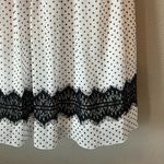 Enfocus Studio   Black and white dress with polka dots and lace detail at hem Photo 5