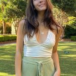 Grey Bandit  white tank top  Photo 1