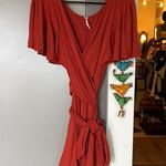 Free People  Orange Flutter Sleeve Wrap Romper V Neck Photo 0