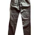 ZARA -BLACK FAUX LEATHER PANTS-SIZE XS Gorgeous black faux leather pants, side zipper, zips at ankles, excellent condition Measurements: Waist: side to side 13 Rise: 11 inches Inseam: 27 inches Photo 7