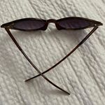 Retro cat eyed sunglasses with gold accents Photo 2