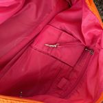 Baggallini  orange carry all nylon tote large with pink lining Photo 3