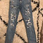 American Eagle Ripped Jeans Photo 0