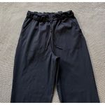 Lululemon  Women's Keep‎ Moving Woven Black Drawstring Lightweight Pants Size 6 Photo 1