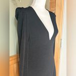 Free People black plunge dress with Statement Sleeves. Size Small Photo 3
