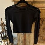 Alo Yoga Alo Black Women's Top with Lace Sleeve Design Photo 0