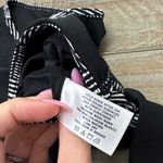 Coolibar Black and White Women's Crop swim top Photo 3