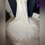 Alfred Angelo Ivory Off-Shoulder Wedding Dress with Gold Embroidery + Veil & Bouquet Photo 10