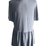 Torrid Super soft babydoll top, short sleeves, v neck, lots of stretch, excellent condition, size 1x Measurements: Bust: armpit to armpit 25 inches Length: shoulder seam to bottom 29 inches Photo 5