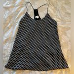 Be cool  Black and White Striped Top Photo 0