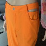 SheIn orange pants with hip cut out Photo 15