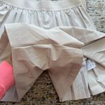 Nike NWT-  24.7 PerfectStretch
Women's Dri-FIT High-Waisted Loose Pleated Shorts Photo 4