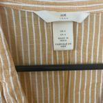 H&M peach colored tan wrap dress Photo 2