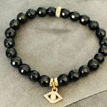 Faceted Black Onyx Beaded Stretch Evil Eye Bracelet Photo 1