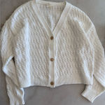 Cyrus  white sweater with gold buttons size small Photo 0