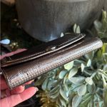 Coach RARE🔥Authentic  1941 SIlver/light gold leather Snap Flap trifold wallet Photo 11