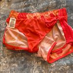 Adidas  running shorts lined orange elastic waist Photo 8