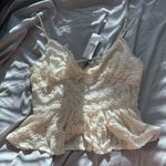 Urban Outfitters  Lace Peplum Top Photo 0