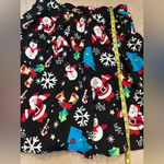 Christmas, Santa, Snowman, and snowflake holiday print skirt in size XL Photo 1