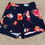 Good Luck Gem Flower pattern flowing shorts with pockets. Photo 0