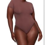 SKIMS  Stretch Cotton Jersey T-shirt Bodysuit In Garnet Photo 1