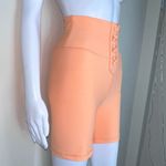 We Wore What  Solid Lace Up Biker in Peach Cobbler Photo 3