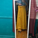 Gold wrap, maxi skirt, beautiful tassel tie, and trim on bottom Size undefined Photo 4