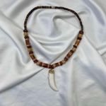 Early 2000's Brown Wood Beaded Boho Grunge Tooth Pendant Necklace Photo 1