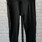 None Black High Waisted Cross Front Leggings Photo 0