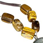 VTG Avon bronze cord authentic tigers eye medallion necklace. Photo 3