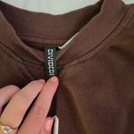 Divided  sweatshirt  Photo 1