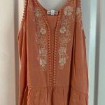 love on a hanger orange flowy tank Photo 0