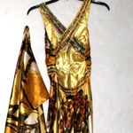 Cinderella Gold Plunge Neck Sleeveless Gown Photo 6