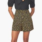 We Wore What Revolve  Black and Ditsy Daisy Romper Size XS Photo 0