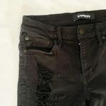 EXPRESS Midrise Black Ripped Skinny Jeans Photo 1