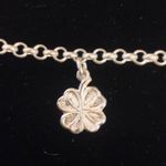 Sterling silver and peridot lucky charm bracelet. Photo 2