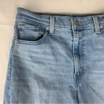 Levi's women's size 29 High waist Mom Jeans light wash denim Photo 7