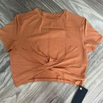 Alphalete Woman’s Premium Wrop SS Crop - Camel , Size XL Photo 0