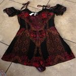 Kendall + Kylie Black and red patterned cold shoulder romper  Photo 1