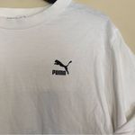 sports wear women’s short sleeve size large with floral puma back design Photo 1