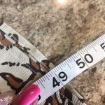 Size medium women’s long sleeve brown floral dress Photo 7