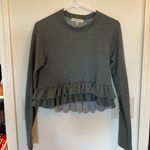 Urban Outfitters  Peplum Sweater Photo 0