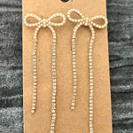 Elegant Gold Bow Earrings Photo 0