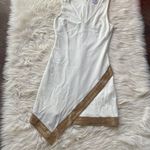 Bebe Ivory Asymmetrical Hem Gold Trim Dress Photo 0