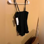 Beyond Control One Piece Swimsuit 8 Black Strapless Ruffle Flowy Tummy Control Photo 8