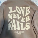 Love Never Fails Shein Hoodie Brown Size 8 Photo 1